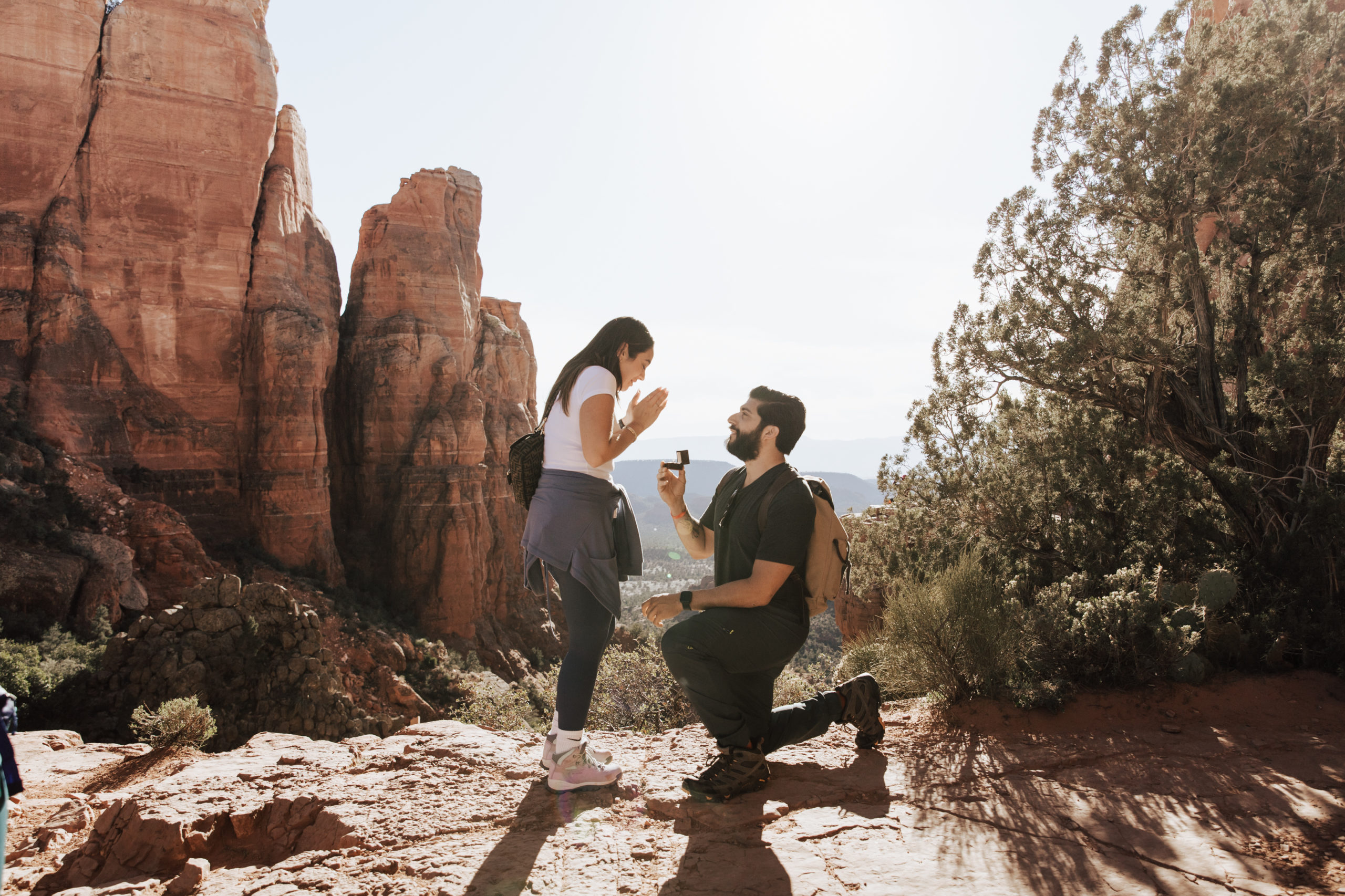 Surprise proposal at Cathedral Rock in Sedona, Arizona during golden hour